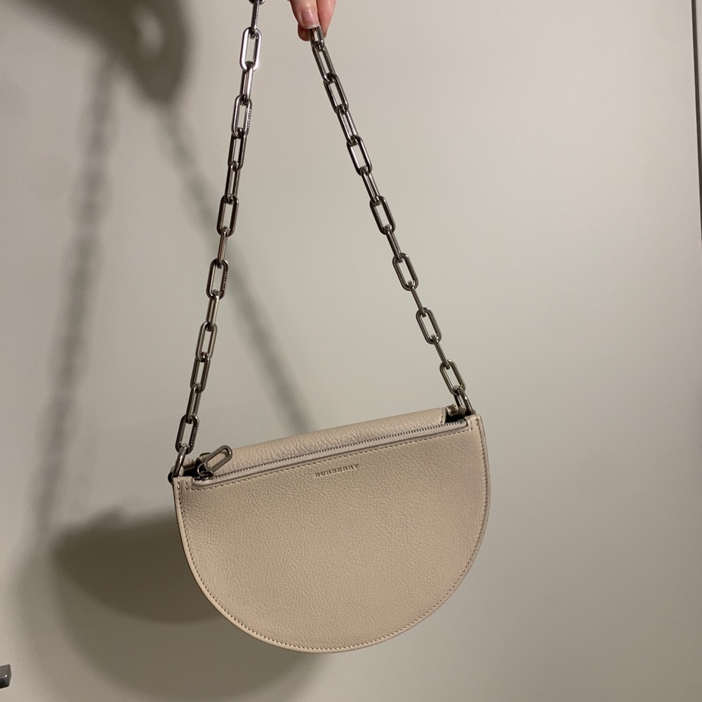 Brand new, never worn, beige Burberry bag with chain